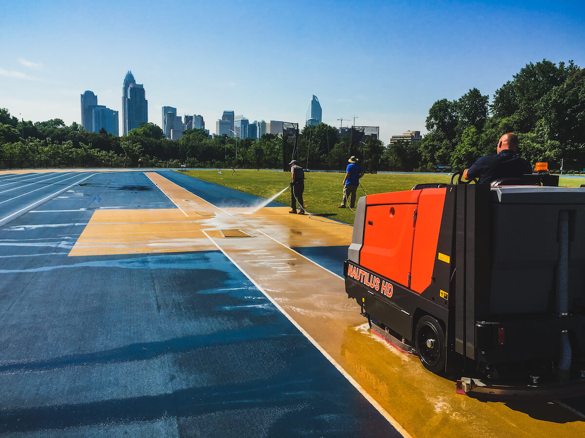 Powerboss Nautilus HD industrial floor scrubber cleaning outdoor track